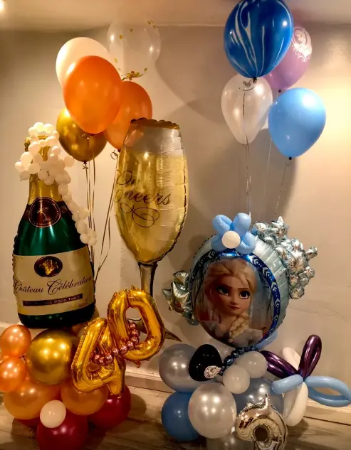 Rainbow themed balloon arch
